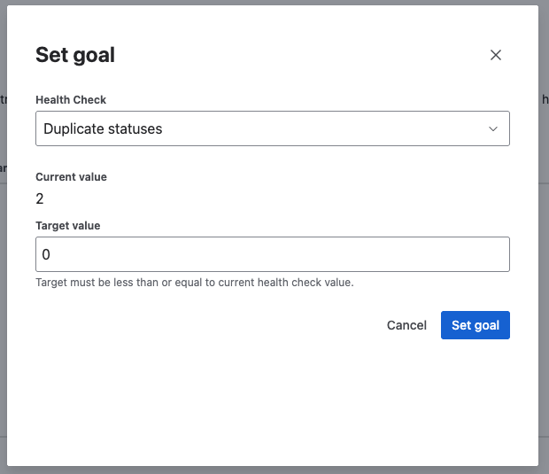 screenshot of the set goal modal, with the health check set to 'Duplicate statuses' and the target value set to zero